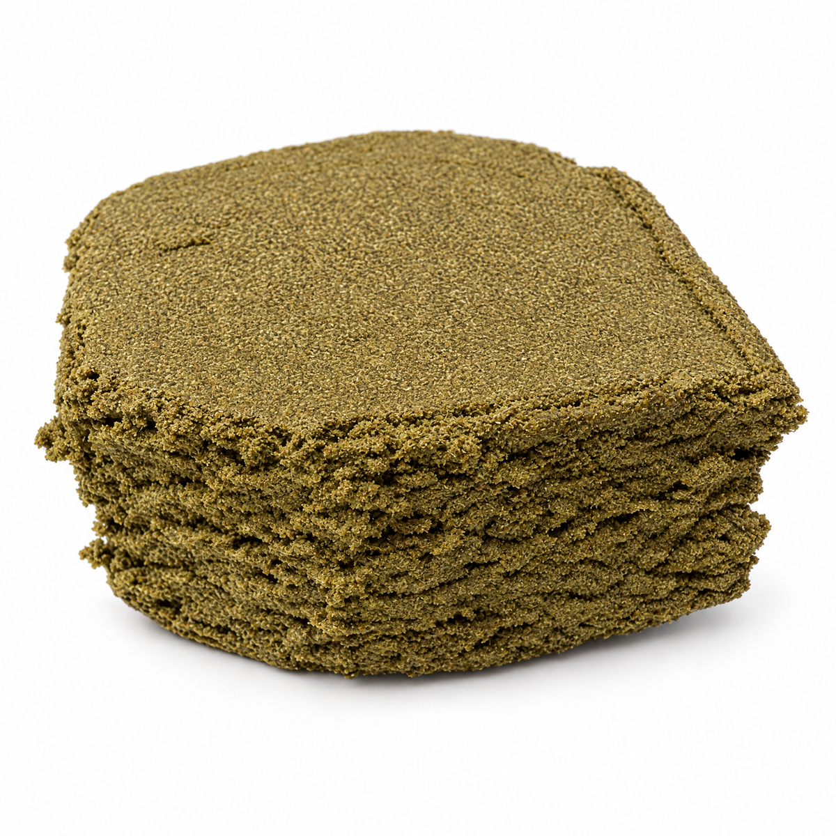Résine de CBD Joy Fruit – pollen CBD pressé sur fond blanc – Tiny Green